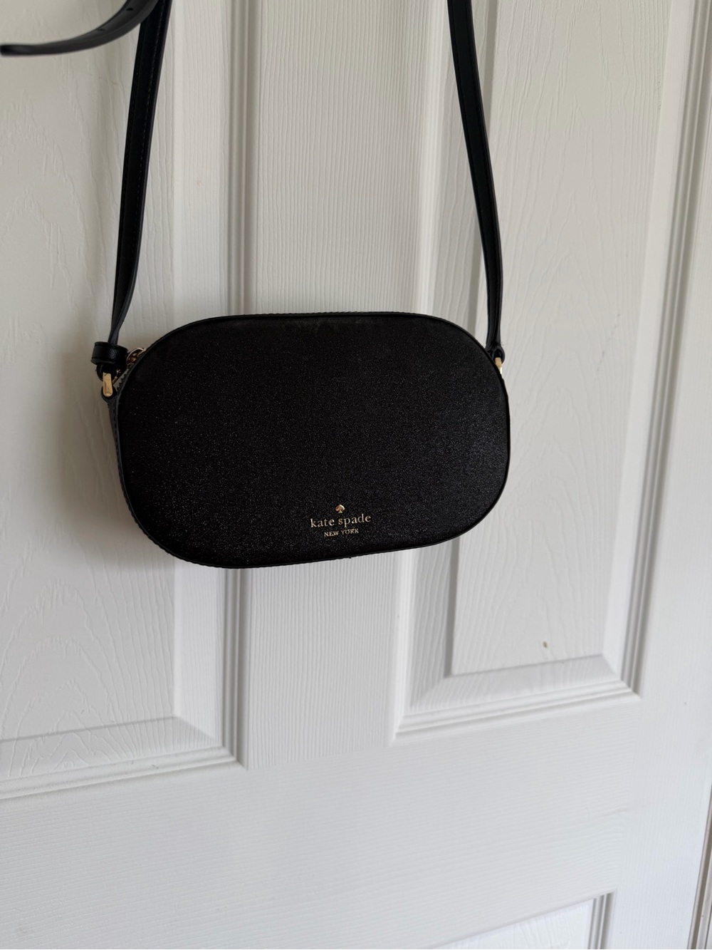 kate spade Black Oval Crossbody with Gold Logo